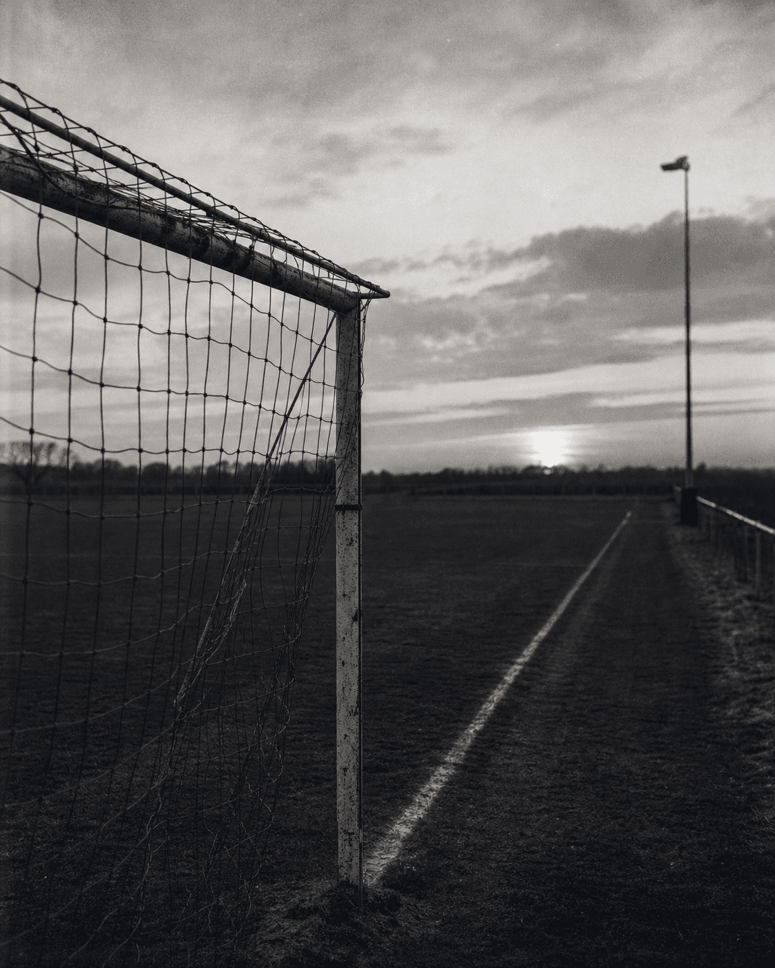 Black-and-white research photograph of a football goal